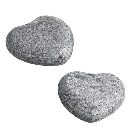 Pair of heart shaped Finnish soapstone sauna accessory stones by Hukka for traditional sauna decor and heat retention