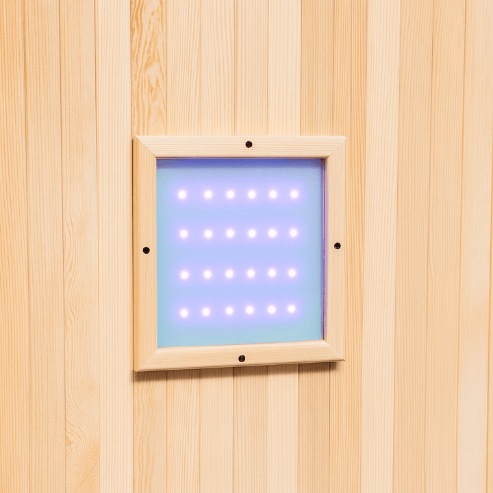 Interior view of a SunRay 1-person infrared sauna featuring soft lighting and wooden paneling