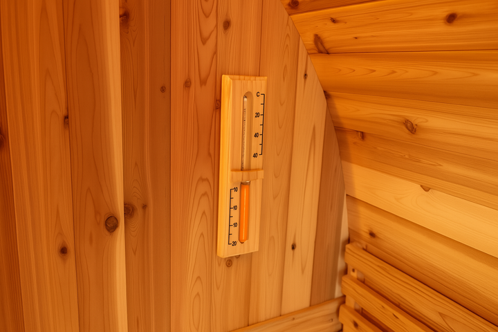 SunRay barrel sauna interior with wooden thermometer for 2-4 person outdoor sauna