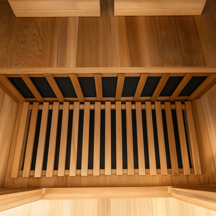 Interior view of SunRay 2-person cedar sauna featuring wooden slats and cedar flooring