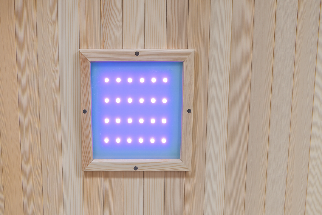 Interior LED control panel light inside SunRay 2-person cedar sauna with natural wood walls