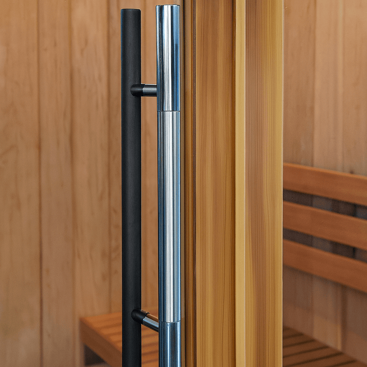 Detail of SunRay 3-person indoor sauna door handle showcasing sleek design and wooden interior