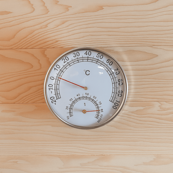 Thermometer for traditional sauna showing temperature and humidity levels for a 3-person outdoor sauna