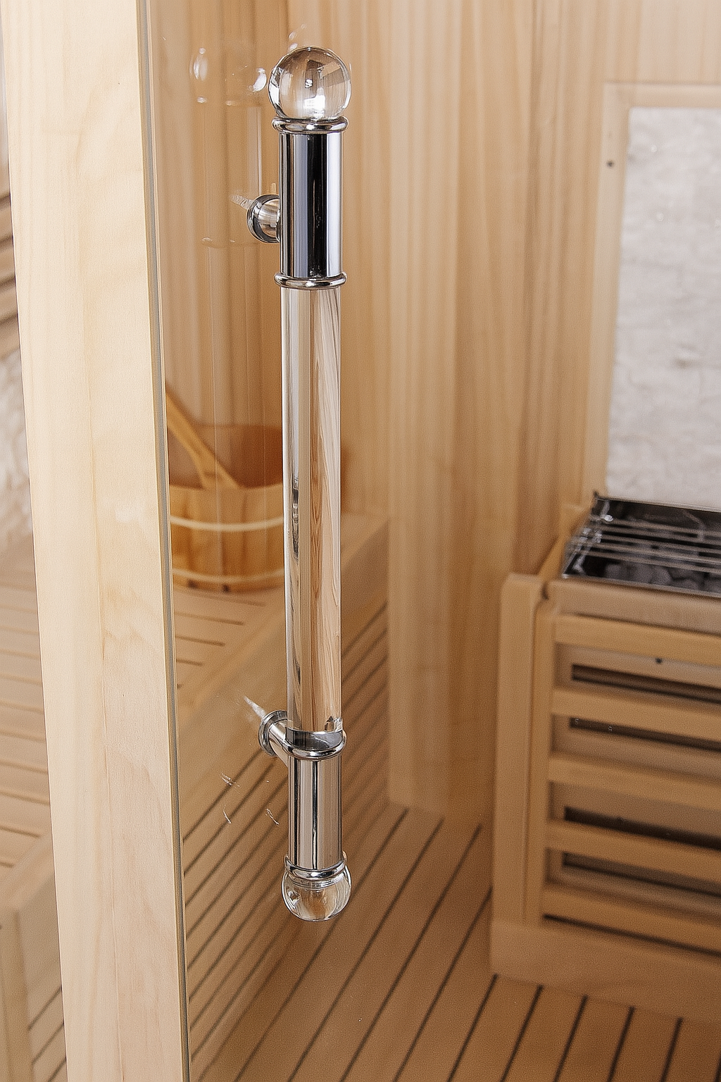 Chrome handle detail on SunRay 3-person traditional sauna wooden interior door