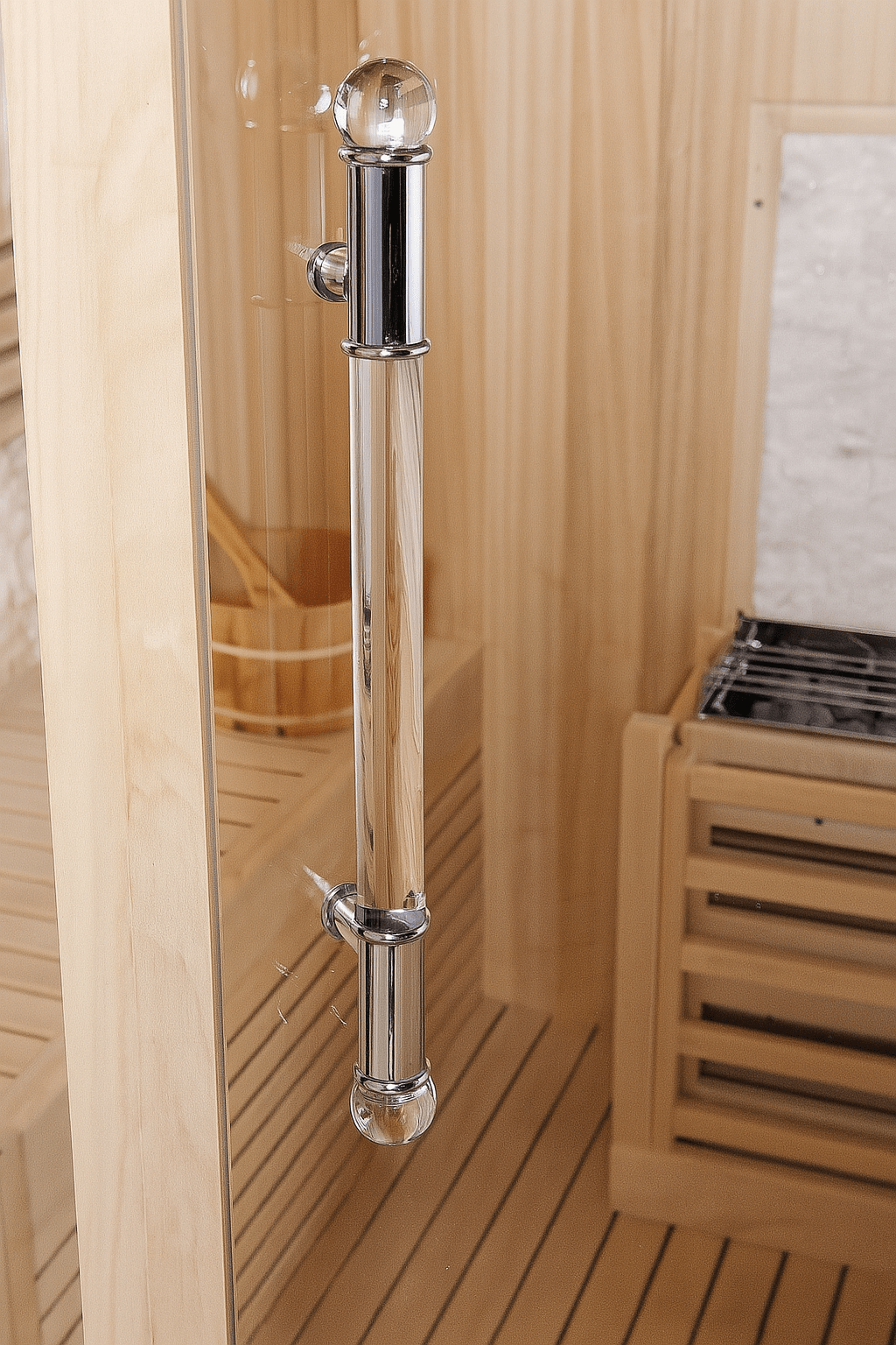 Interior view of a SunRay 3-person traditional sauna with sleek glass handle and wooden features