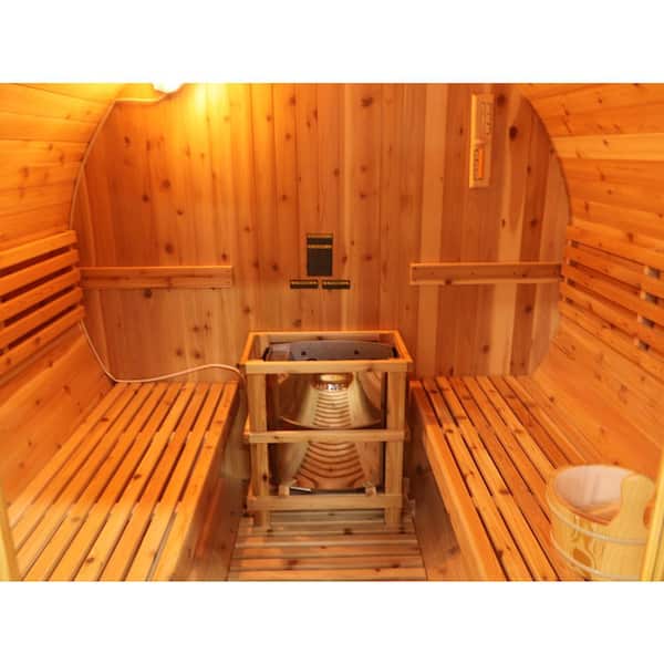 Interior view of a 4-person barrel sauna featuring wooden benches and heater for relaxation
