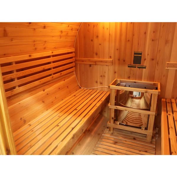 Interior view of a SunRay 4-person barrel sauna with wooden benches and a stove
