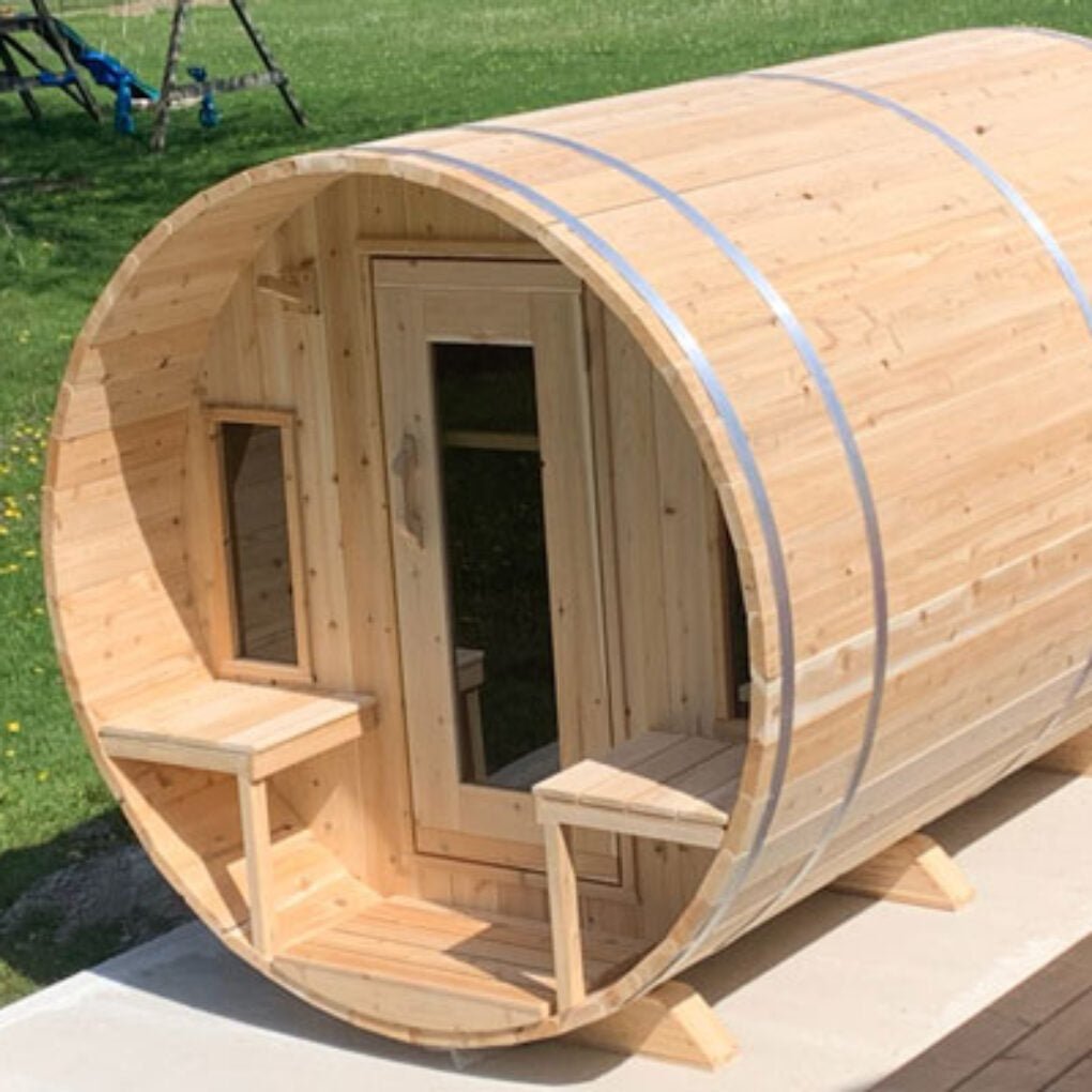 Leisurecraft Backyard Barrel Sauna for Sale featuring natural wood design and cozy seating areas