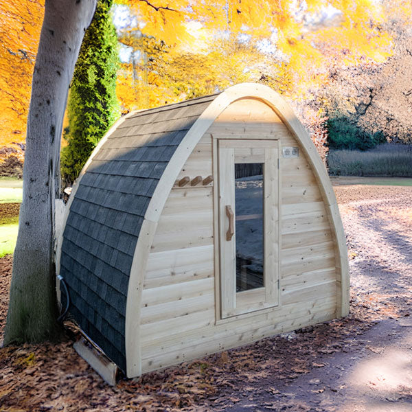 Leisurecraft traditional backyard sauna with curved roof and wooden exterior in autumn setting backyard saunas for homes