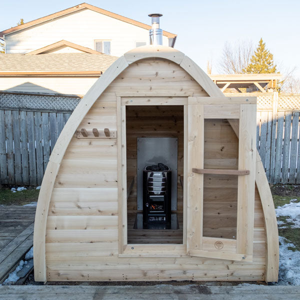 Leisurecraft traditional wooden sauna with open door showing heater for backyard saunas for homes