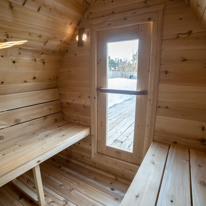 Leisurecraft traditional sauna interior with wooden benches and glass door for backyard saunas for homes