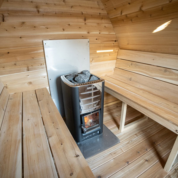 Leisurecraft traditional sauna interior with wood heater and benches ideal for backyard saunas for homes