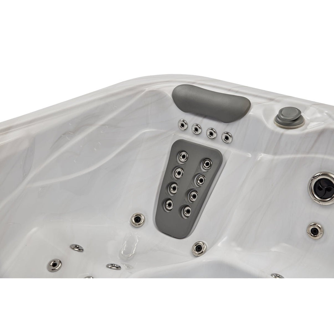 Interior view of the Casey Elite hot tub showcasing multiple spa jets and ergonomic headrests
