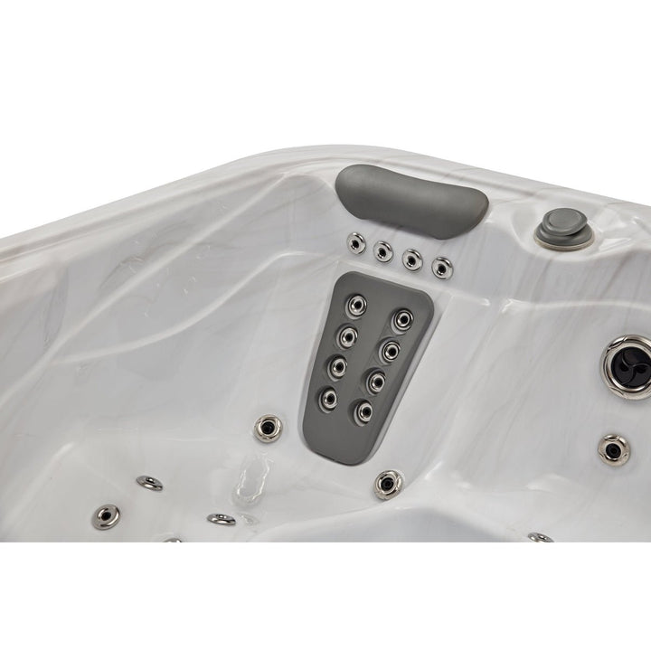 Interior view of the Casey Elite hot tub showcasing multiple spa jets and ergonomic headrests