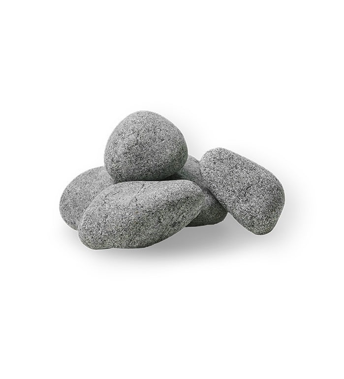 Stack of smooth stones for use with the HUUM compact sauna heater kit designed for optimal heat retention