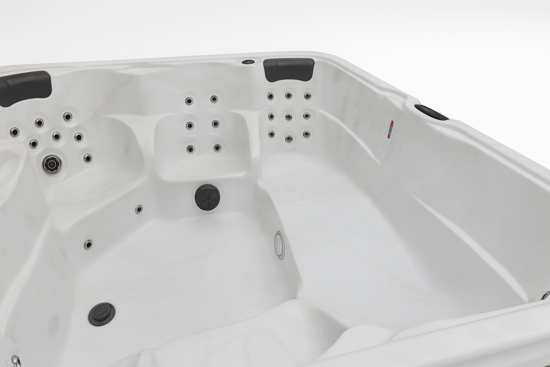Luxury Spa Eclipse Studio Series hot tub interior with multiple jet nozzles and ergonomic seating