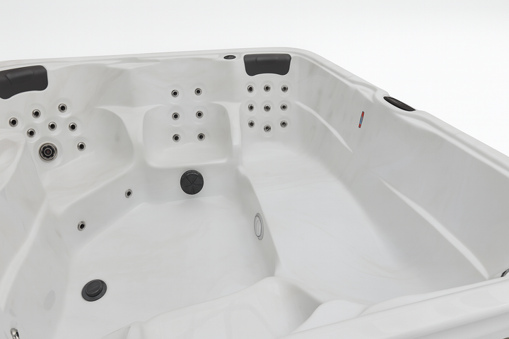 Luxury Spa Eclipse Studio Series hot tub interior with multiple jet nozzles and ergonomic seating
