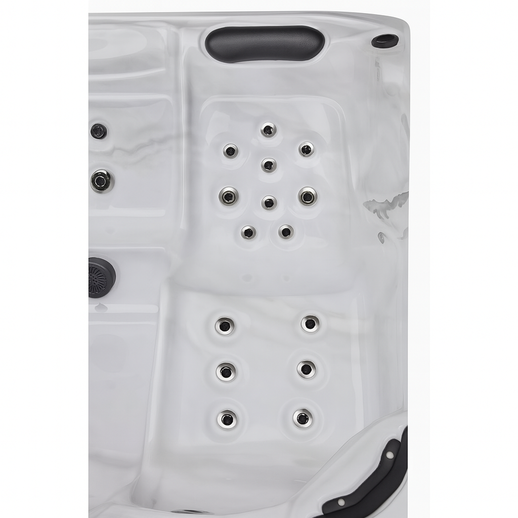 Luxury Spa Estes Studio Series spa white hot tub top view with multiple jet seats and headrest