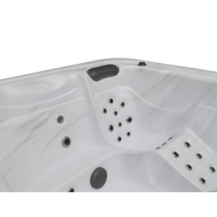 Estes Studio Series spa with elegant marble design and multiple hydrotherapy jets for relaxation