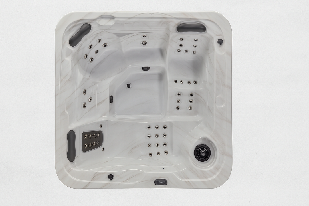 Luxury Spa Estes Studio Series spa top view showing multiple seating and jet configurations in white marble finish