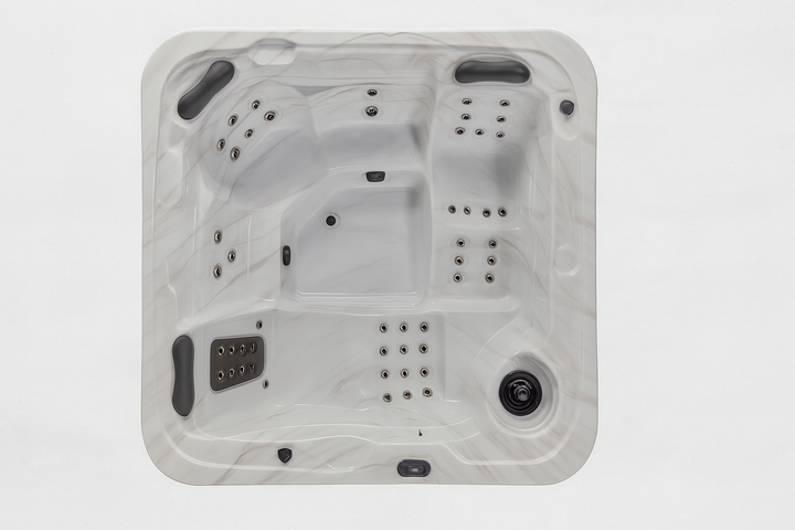 Luxury Spa Estes Studio Series spa top view showing multiple seating and jet configurations in white marble finish