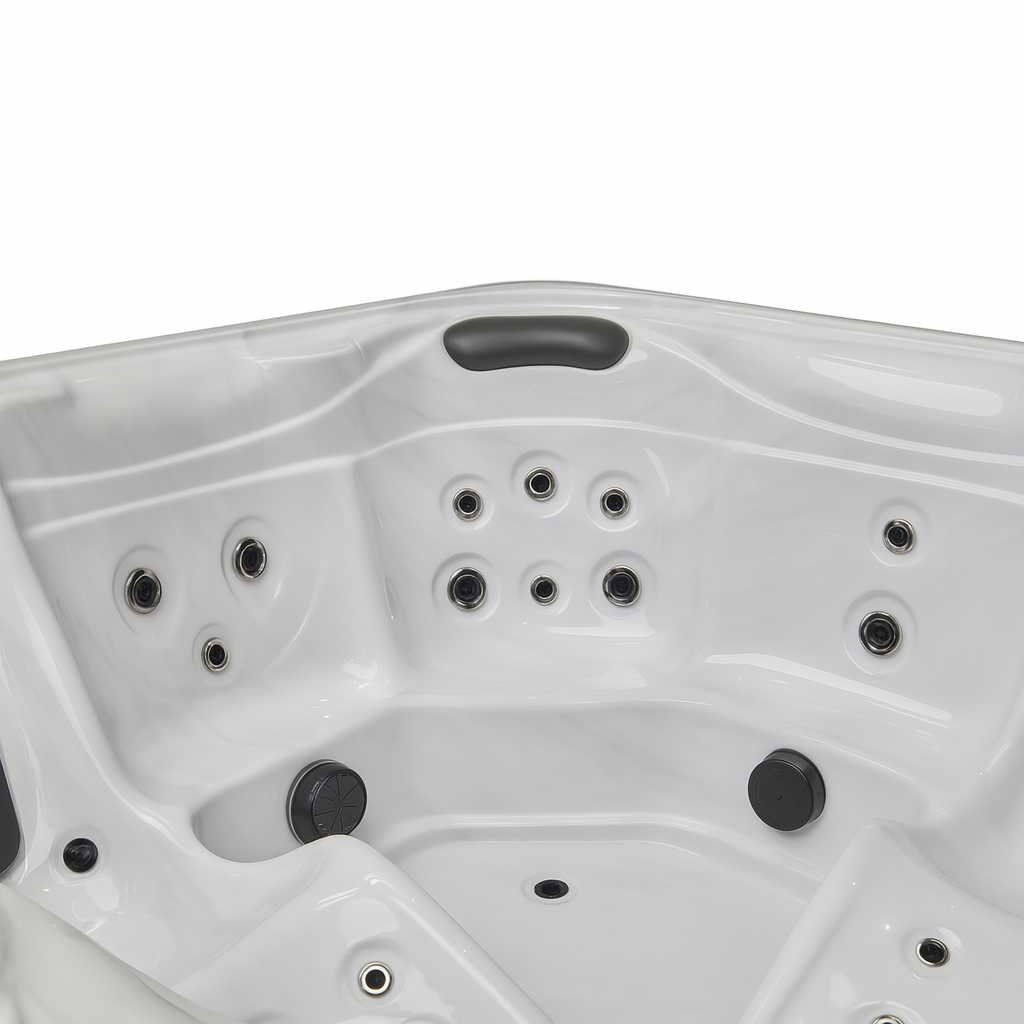 White Luxury Spa Estes Studio Series spa hot tub interior with multiple massage jets and headrest