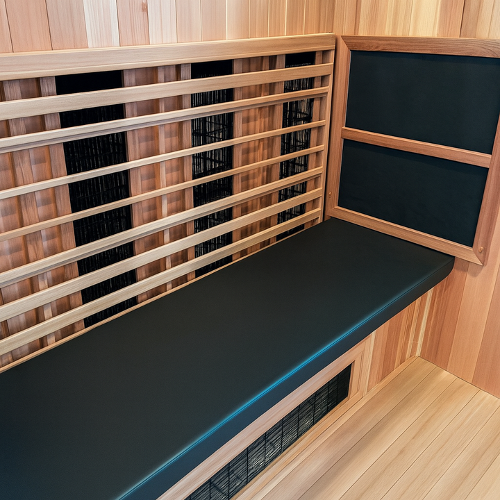 Finnmark FD-3 sauna accessory wooden bench with black cushioned seat and backrest inside sauna room