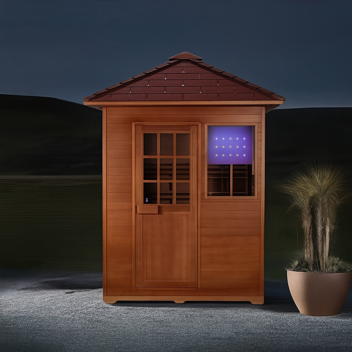 SunRay traditional 3-person outdoor sauna with wooden exterior and small window at night