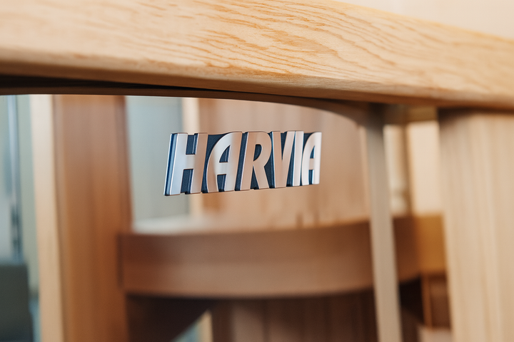 SunRay traditional 4-person indoor sauna with Harvia brand details in natural wood finish