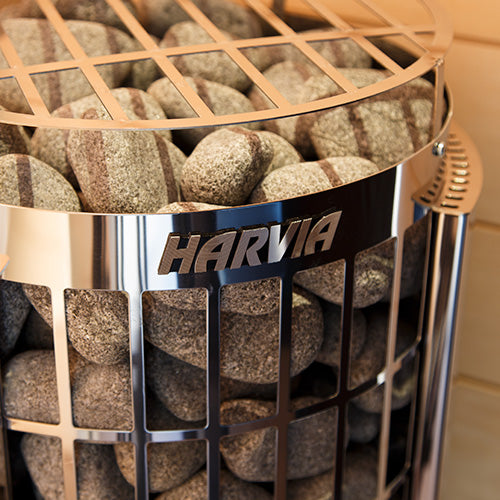 Close up of Harvia Cilindro PC80E electric sauna heater stainless steel stone filled cylinder