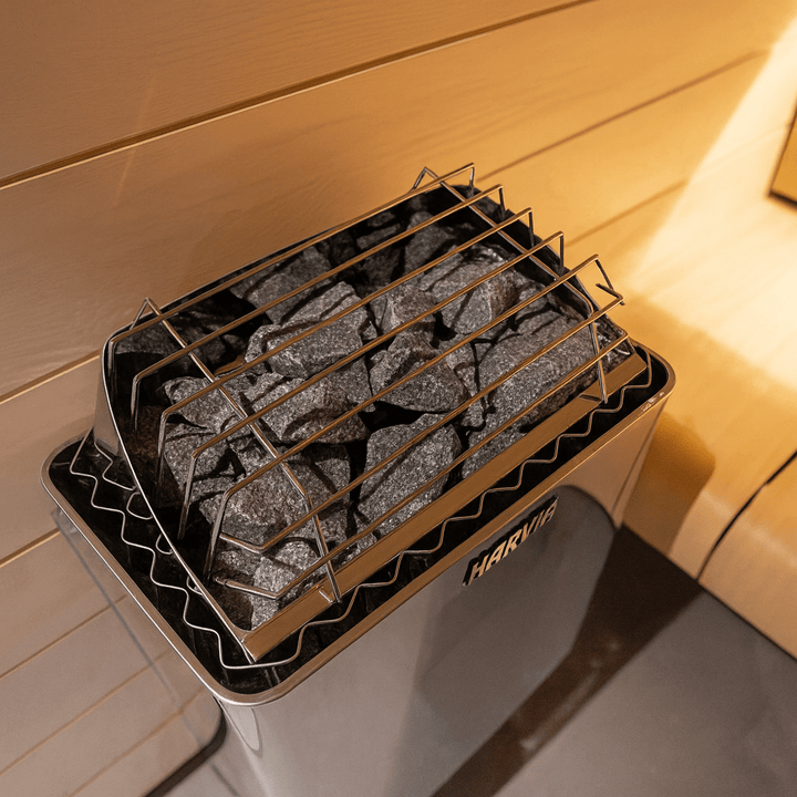 Harvia KIP30B electric sauna heater with stones and metal grill for optimal heating and relaxation