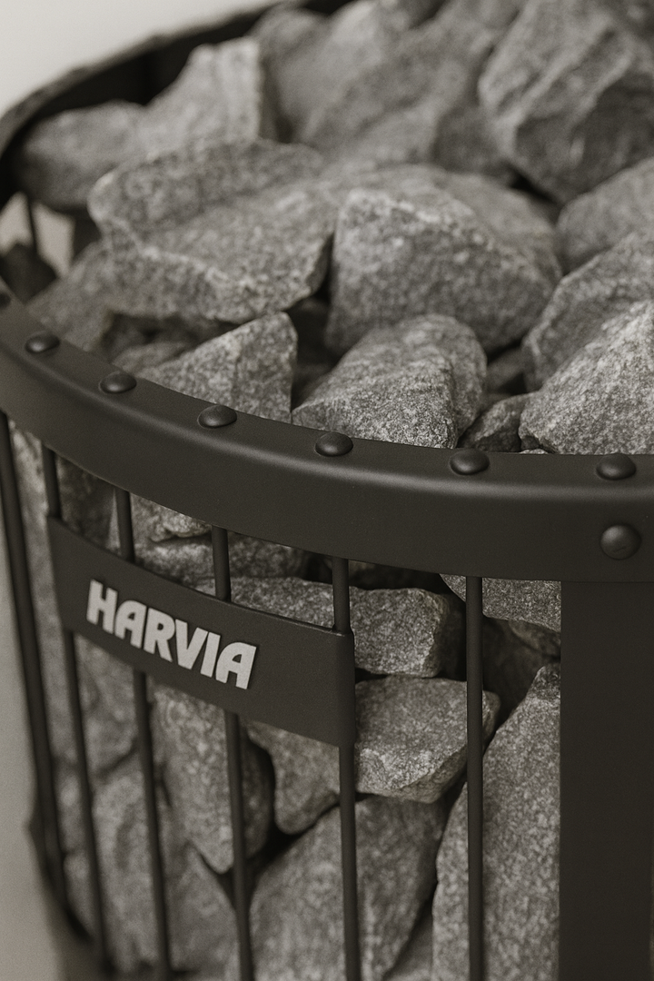 Harvia Legend 240GF sauna heater with metal frame and sauna stones for effective heat distribution