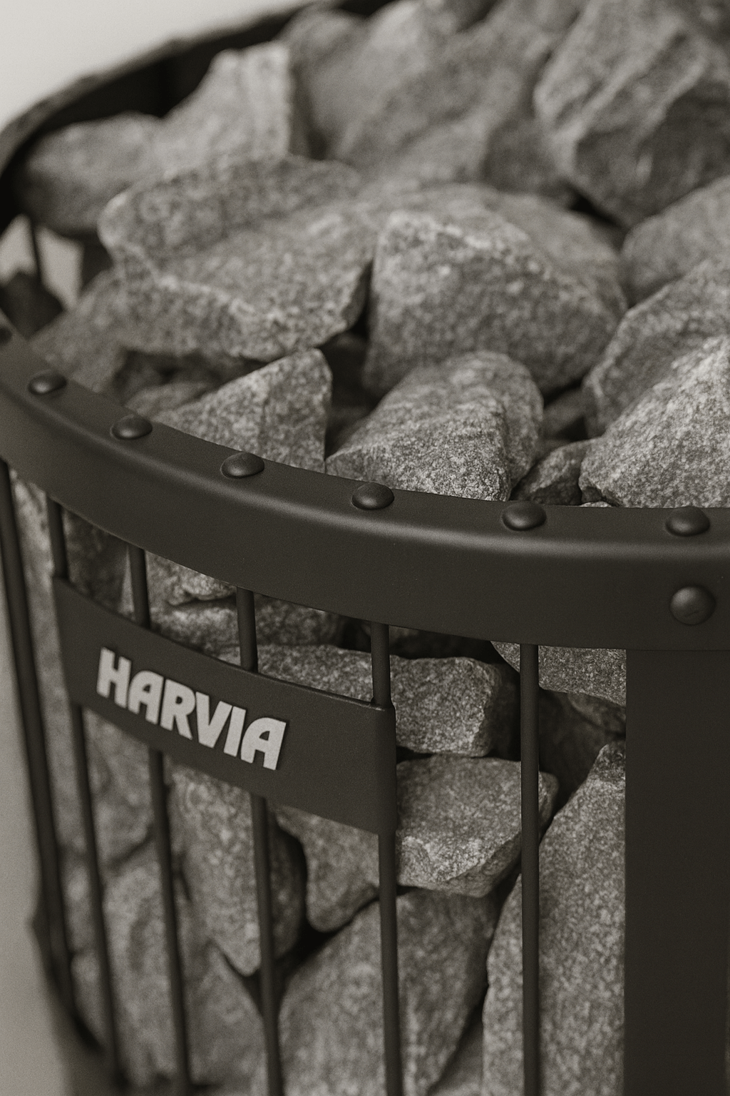 Harvia Legend 240GF sauna heater with a sleek metal design and heated natural stones for authentic sauna experience