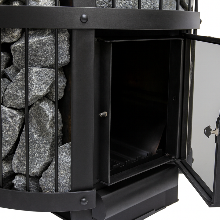 Close up of Harvia Legend 240GF sauna heater with black metal frame and sauna stones inside