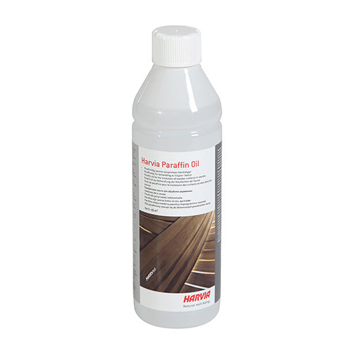 Harvia paraffin oil for sauna wood in a white plastic bottle with label and wooden sauna bench image