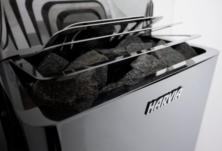 Harvia The Wall sauna heater with sleek design and stacked stones for optimal heating