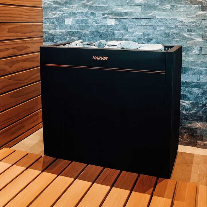 Harvia Virta Pro HL200E for spas black sauna heater with stones installed in wood and stone sauna