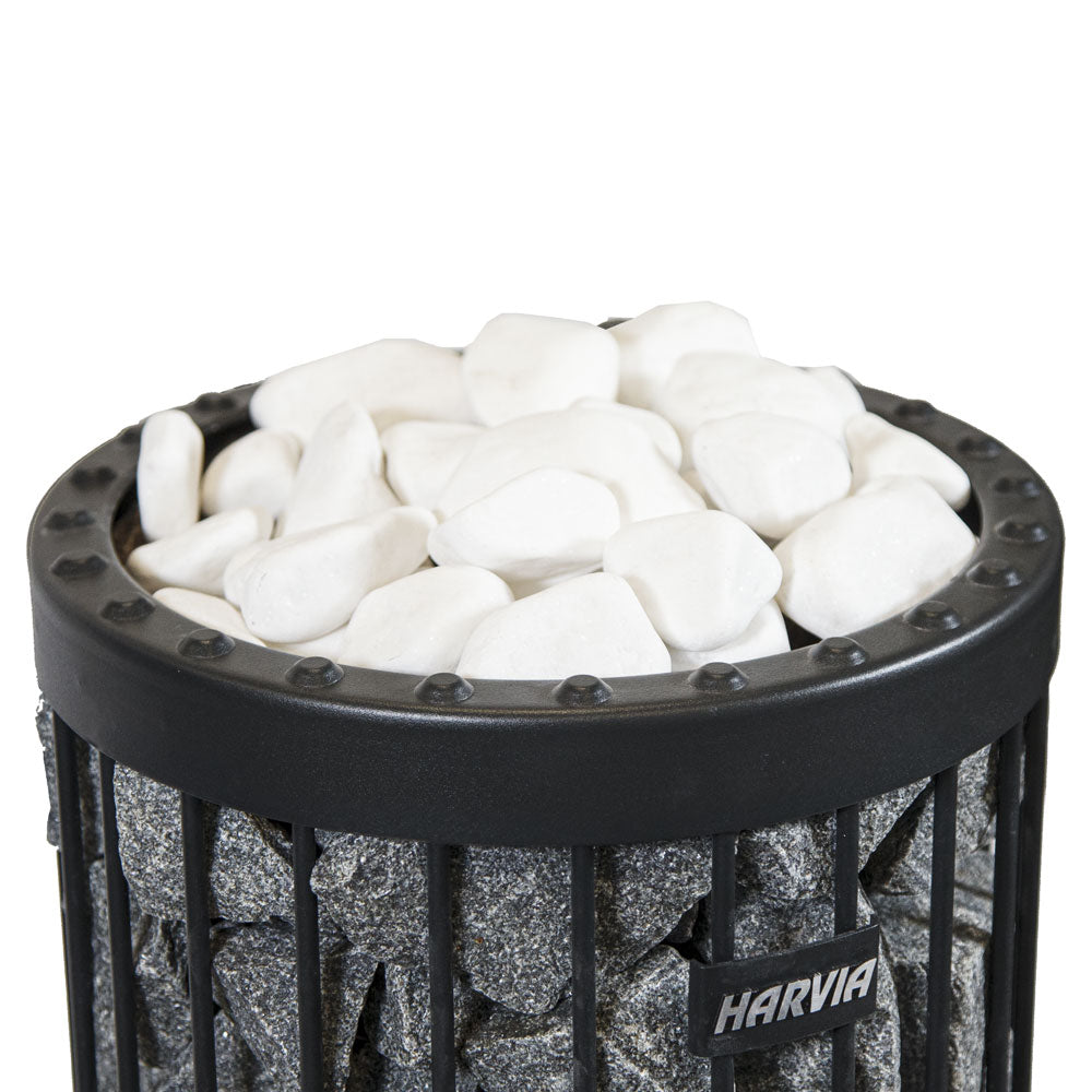 Harvia sauna heater filled with white decorative sauna stones on top for enhanced sauna experience