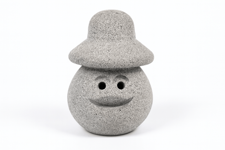 Hukka Lyyli sauna elf figurine made from natural stone with a friendly smile and unique design