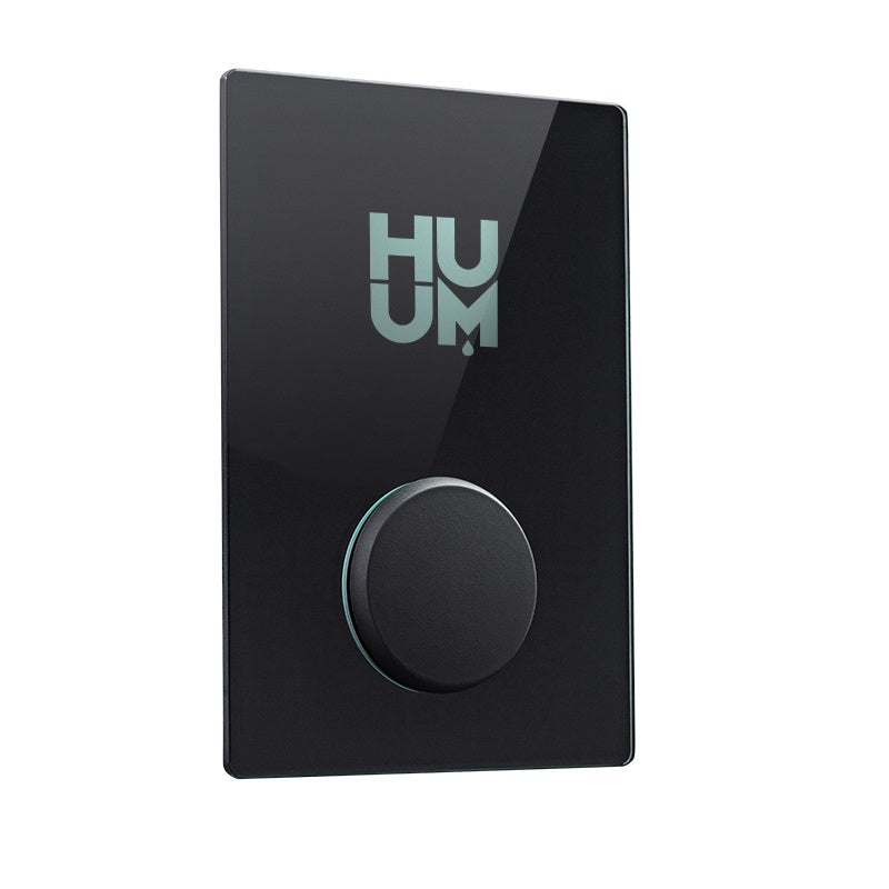 HUUM digital sauna control panel with sleek black design and round dial for easy temperature adjustments