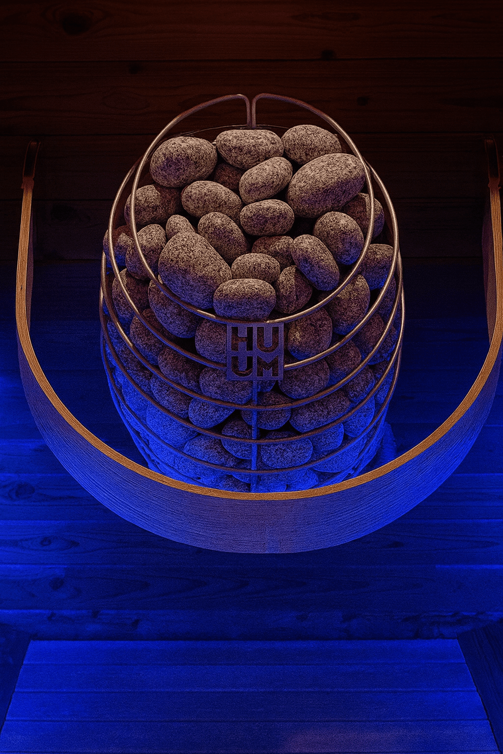 HUUM DROP sauna heater with stylish stone arrangement for optimal heat distribution