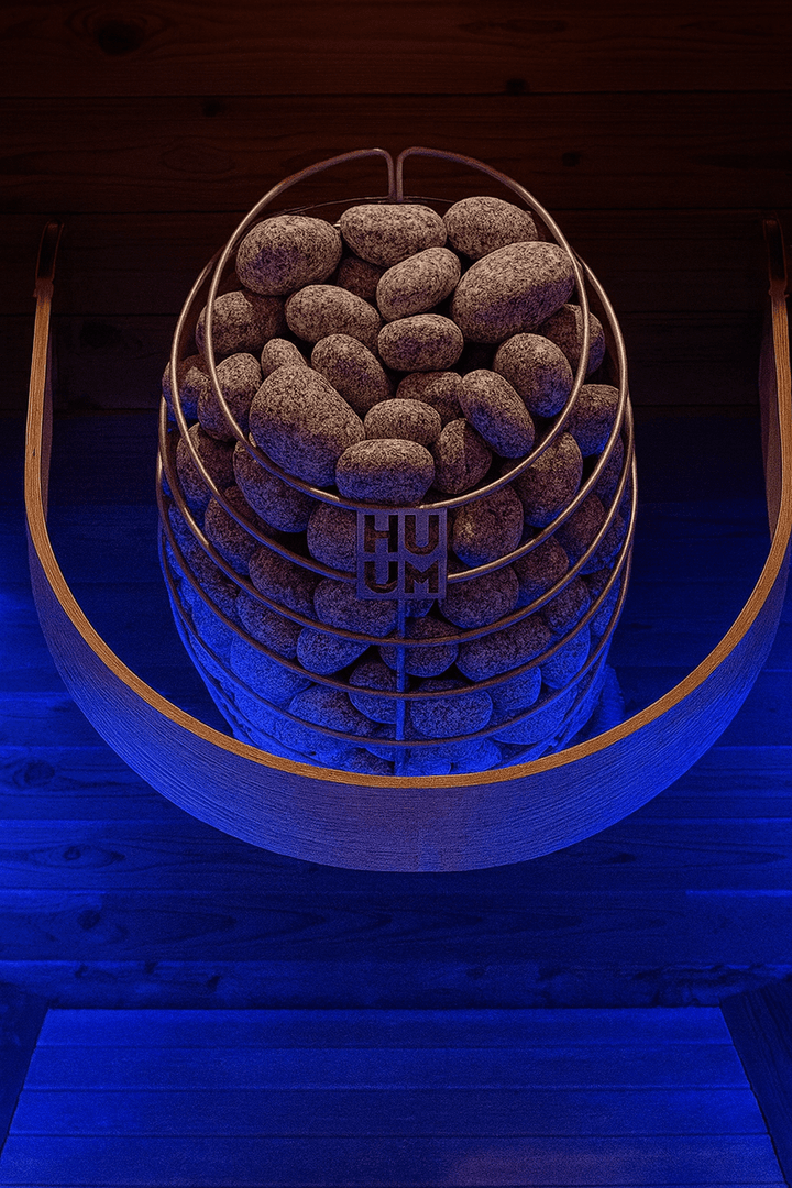 HUUM DROP sauna heater with stylish stone arrangement for optimal heat distribution