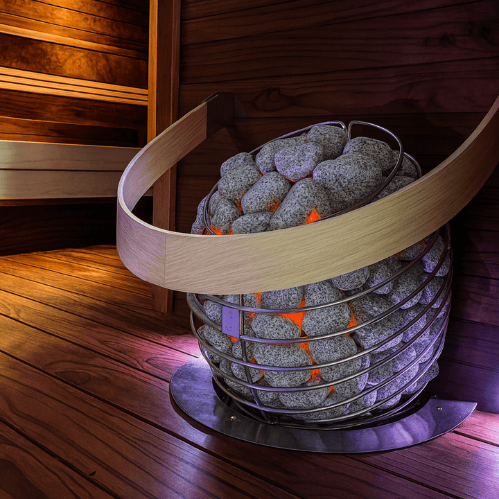HUUM DROP sauna heater with natural stones and wooden accents in a modern sauna setting