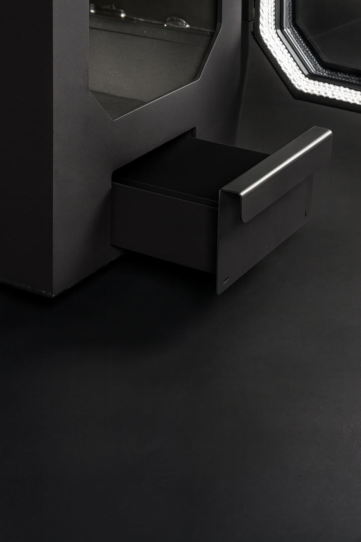 Close-up of HUUM HIVE Flow Series sauna heater black drawer handle and sleek modern design