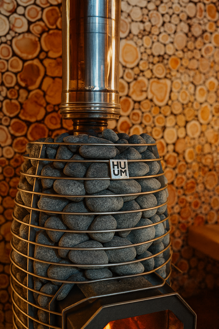 HUUM sauna heater with stones in a wooden sauna room home sauna heater package