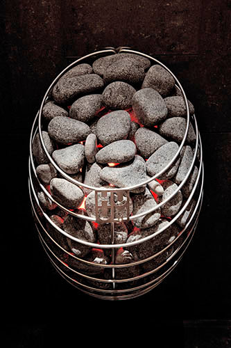 HUUM DROP 7.5kW sauna heater stainless steel cage filled with glowing sauna stones and red embers
