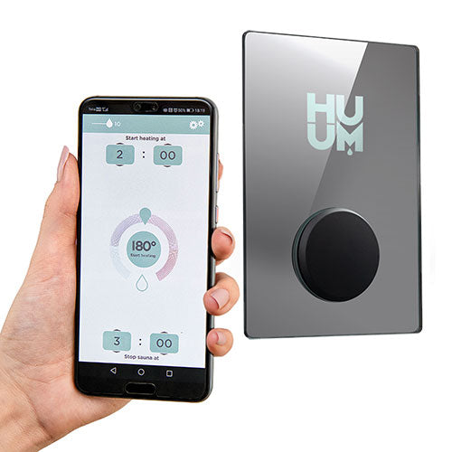 HUUM UKU Mirror sauna control accessory with sleek black dial and smartphone app interface