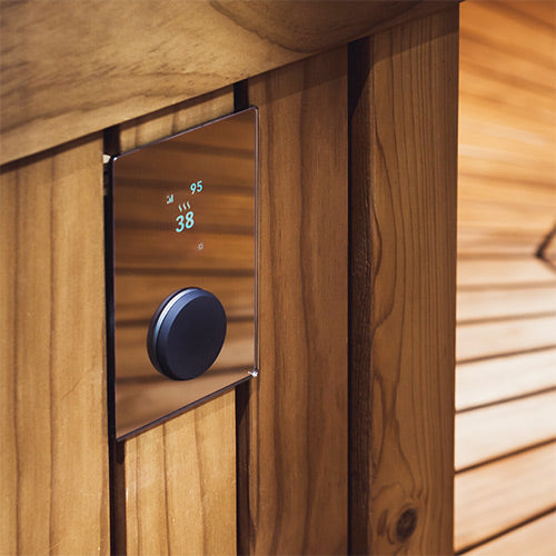 HUUM UKU Mirror sauna control mounted on wooden wall with digital display and black dial