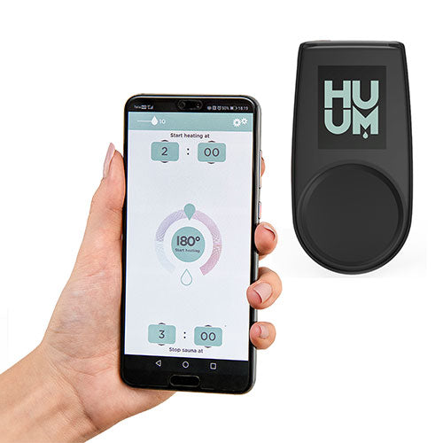 HUUM UKU Wi-Fi sauna controller next to smartphone showing sauna temperature and timer settings