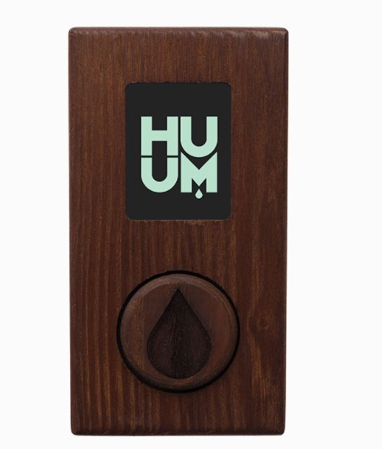 HUUM UKU Wi-Fi sauna controller in dark wood finish with digital display and control knob